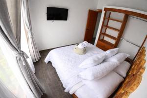 Habitación cama Queen baño compartido