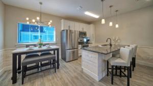 Resort Pool Walk to the Beach Island Views Little Beach House by AvantStay