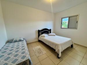 Apartamento de dois quartos com garagem coberta