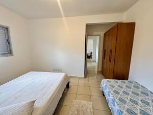 Apartamento de dois quartos com garagem coberta