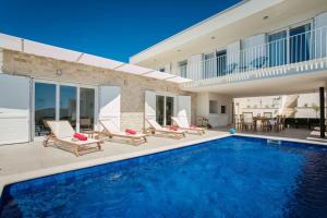 Luxury villa Rogoznica Sea Side with heated pool