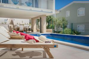 Luxury villa Rogoznica Sea Side with heated pool