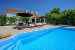 Luxury villa Essencia Milna Brač with heated pool