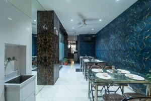 Glitz Rexton Inn - Near IIT Powai