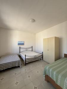 Casa vacanza Ninetta a Torre Lapillo con cortile