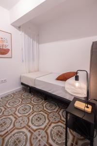 En Corts by Concept Flats
