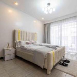 stunning one bedroom apartment with speed wifi,ample parking space, swimming pool, fully equipped gym and amazing city views