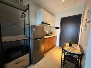 Cozy Studio with Workspace at The Highline Residences