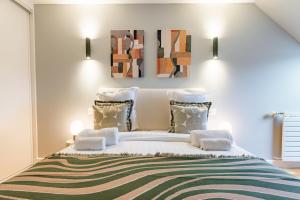 Grand appartement design sous les toits, Paris 16e