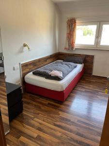 Gästehaus mit 12 Zimmern, 25 Betten, 2 Küchen, Dusche, WC und große Terrasse