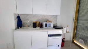 WeHost PROM- Jardin & Mer -Cœur Promenade des Anglais-2 personnes 1 canapé-lit