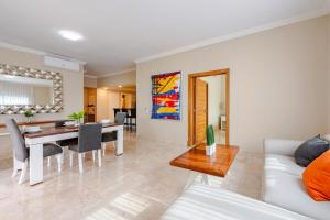 Steps from the ocean and white sand, top location