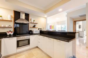 Steps from the ocean and white sand, top location