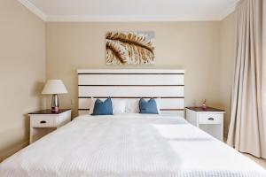 Steps from the ocean and white sand, top location