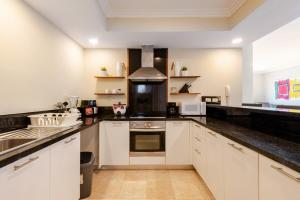 Steps from the ocean and white sand, top location