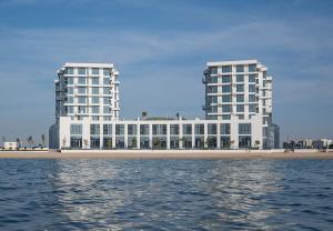 Stylish 2BR in Blue Bay Walk Ajmal Makan