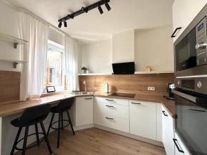 Ferienwohnung Am Bahnhof - Self Check-in - Terrasse