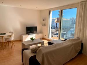 Apartamento con terraza frente al mar