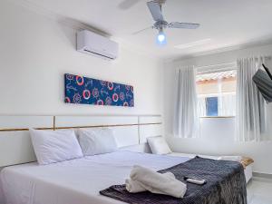 Casas no Residencial Mont Sião com 1, 2 ou 3 suítes (todas com ar condicionado) condomíno a poucos metros da praia de Taperapuã (Axé Moi), com 2 piscinas adulto, 2 infantil, sauna e 2 portarias, casas com internet privativa 300MBPS