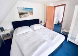 KAPITÄNS HUS 1- nur 550m zum Strand, mit Infrarotsauna, großer Garten, Kamin, Whirlpool
