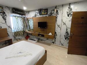 Tulasi residency by pickurstay Hotels