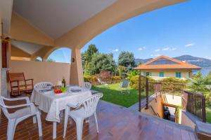 Sunset in Ranco: Lakeview Townhouse with Private Garden - Happy Rentals