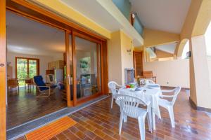 Sunset in Ranco: Lakeview Townhouse with Private Garden - Happy Rentals