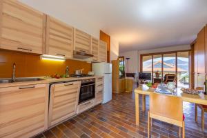 Sunset in Ranco: Lakeview Townhouse with Private Garden - Happy Rentals