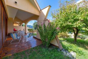Sunset in Ranco: Lakeview Townhouse with Private Garden - Happy Rentals
