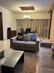 Homly Stays 4BHK 1209 Pinnacle D Dreams