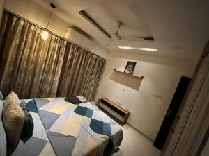 Homly Stays 4BHK 1209 Pinnacle D Dreams