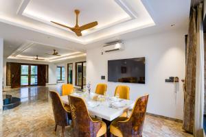 ELIVAAS Sanisa Farm 3-BHK Farmhouse with Pvt Pool, Game Zone & Lush Garden