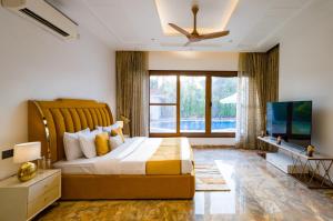 ELIVAAS Sanisa Farm 3-BHK Farmhouse with Pvt Pool, Game Zone & Lush Garden