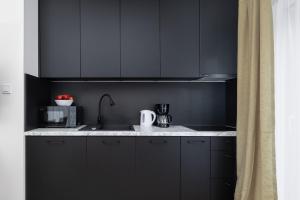 Stylowy Apartament Blisko Morza z Parkingiem by Noclegi Renters