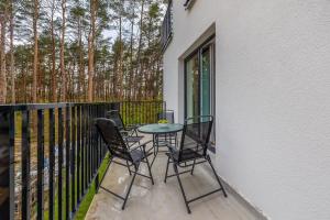 Stylowy Apartament Blisko Morza z Parkingiem by Noclegi Renters