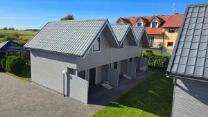 DOMKI MALIBU SARBINOWO