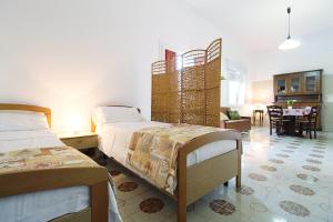 Appartamento Ulivo con giardino a Torre Suda - Apulia Home