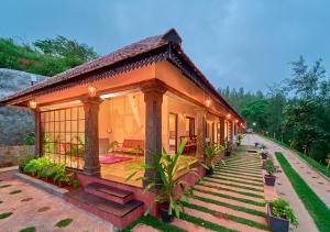 Whispering Hills Pine Malhar Pool & Tent Attappadi by VOYE HOMES