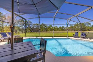 654- Newly Renovated Fabulous 4-Bedroom Pool Home in Watersong Resort, Game Room, Theater Room and More