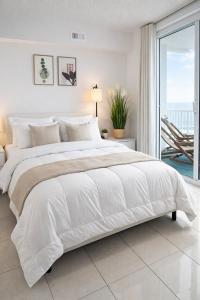 Stunning High Rise - 2BR - 3Beds - 6 guests - Balcony Sea View - Free Parking