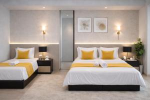High floor Seaview 2BR Loft Maritime Suites Goerge Town Karpal Singh