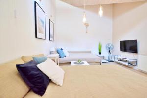 Plac Rybaków Cozy Victus Apartments near the Beach by Noclegi Renters