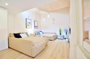 Plac Rybaków Cozy Victus Apartments near the Beach by Noclegi Renters