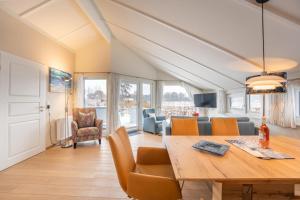 4 Personen ebenerdiges, barrierefreies Ferienhaus in erster Reihe zum See in Otterndorf