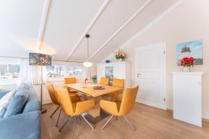 4 Personen ebenerdiges, barrierefreies Ferienhaus in erster Reihe zum See in Otterndorf