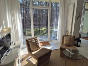 Südwind App2 - Modernes Apartment mit Pool und Sauna, nur 3 Gehminuten zum Strand