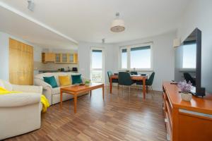 Spacious Apartment With Balcony Suited For Remote Work by Noclegi Renters