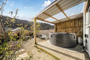 Spacious 4-Bed Welsh Valley Retreat with Hot Tub