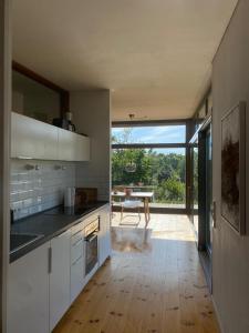 Designholzhaus mit Panoramablick in der Märkischen Schweiz