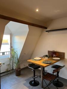 T3 moderne en hyper-centre dans bâtisse XVIIe